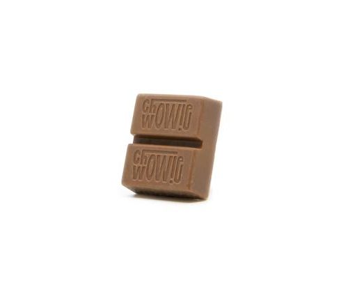 SOLID THC/CBD MILK CHOCOLATE by CHOWIE WOWIE Bar of milk chocolate with 10mg THC and 10mg CBD; breakable into two pieces.