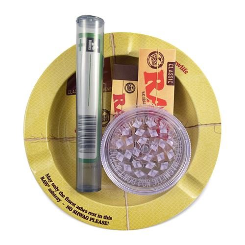ACCESSORY STARTER KIT by RAW Kit includes Raw 1 ¼" papers, Raw tips, Raw ashtray, cone tube, and a plastic grinder.